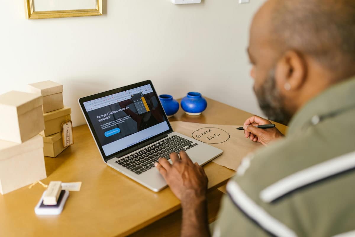 A Man Looking at a Website on the Internet