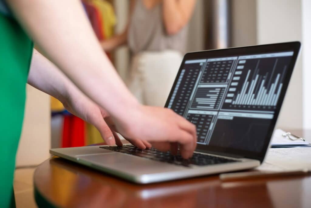 Person Using Gray Laptop Computer